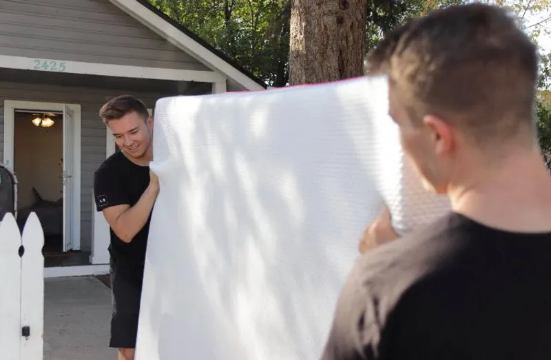 Legacy Moving Denver team loading a moving truck