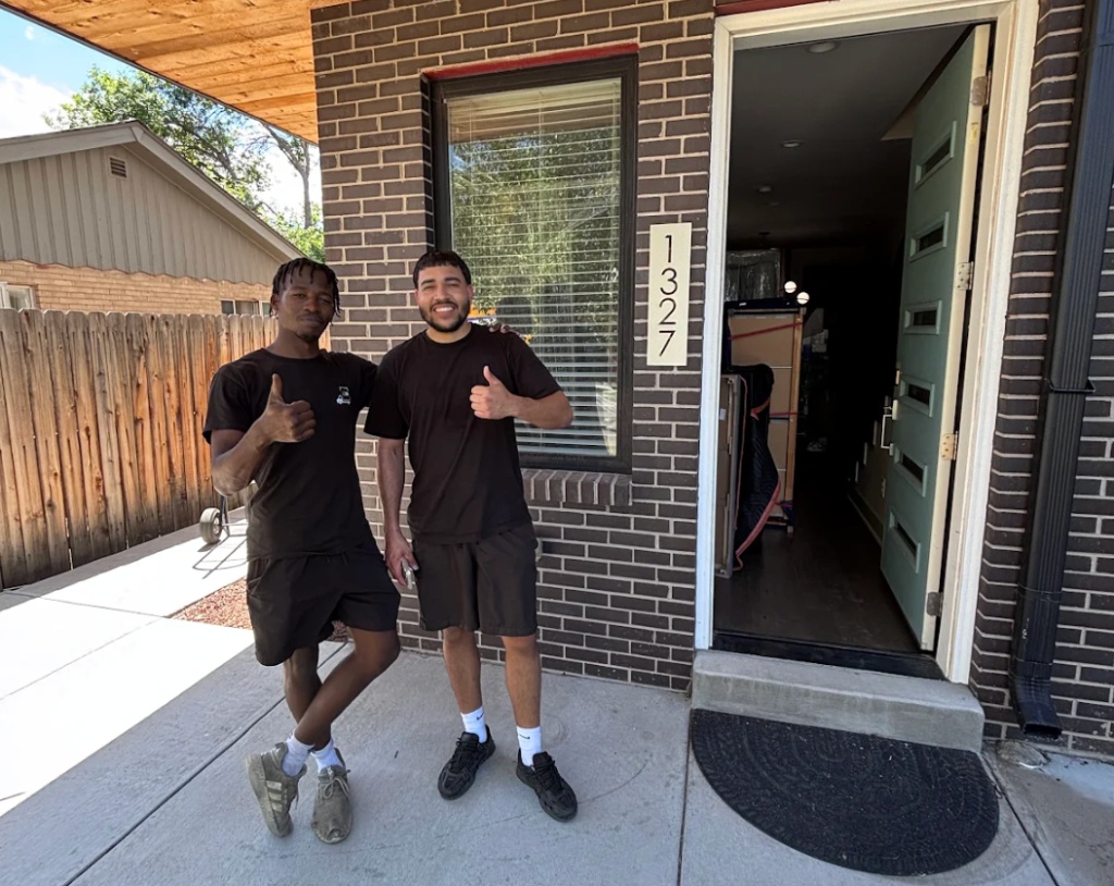 Legacy Moving Denver movers at house door