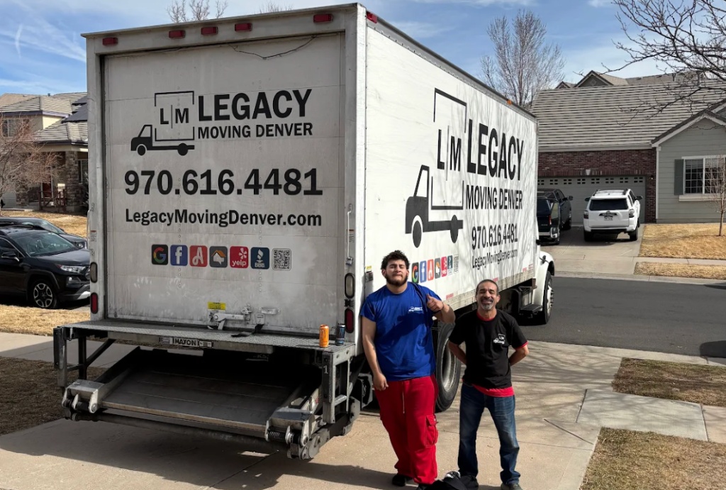 Legacy Moving Denver crew with two trucks on street