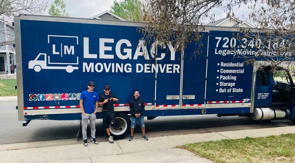 Legacy Moving Denver three movers with blue truck