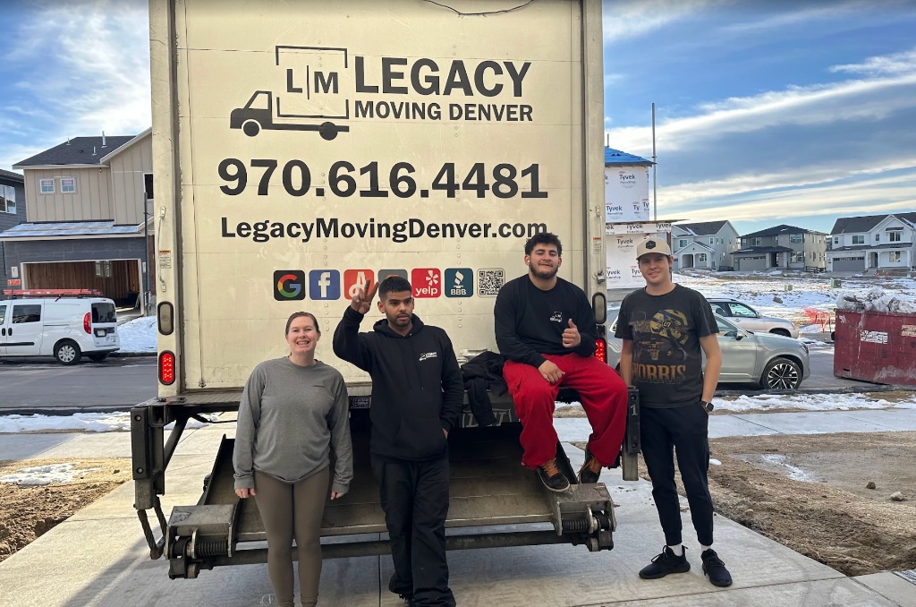 Legacy Moving Denver four movers at truck