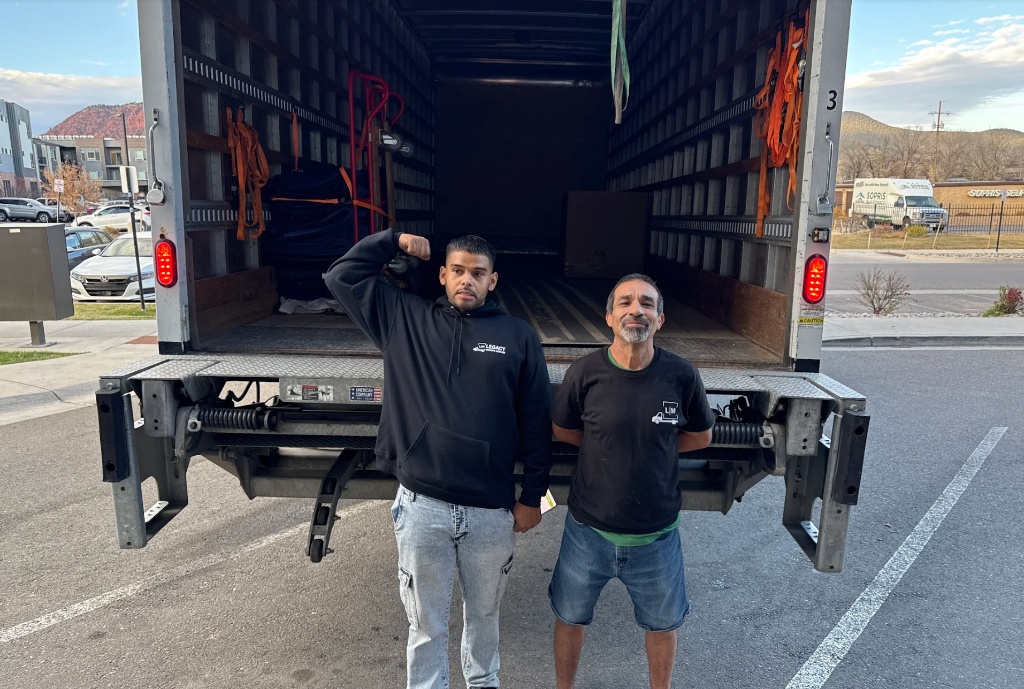 Legacy Moving Denver two movers at truck
